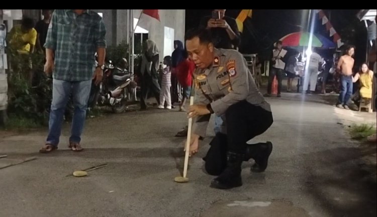 Polsek Liang Anggang Hidupkan Tradisi Balogo, Warga Antusias Meriahkan HUT Bhayangkara ke-80